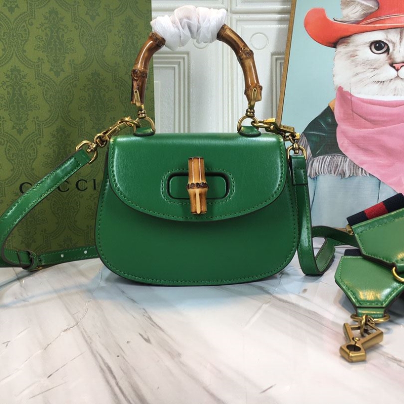 G*u*i top handle bags